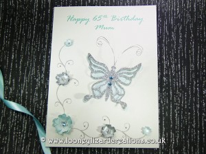 New Birthday card featuring butterfly with flowers