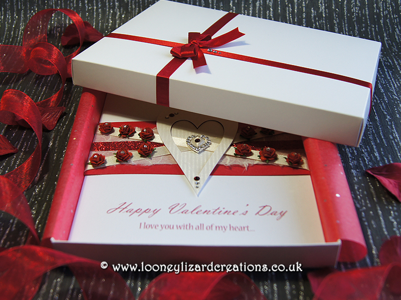 luxury boxed valentines card featuring twelve red roses.