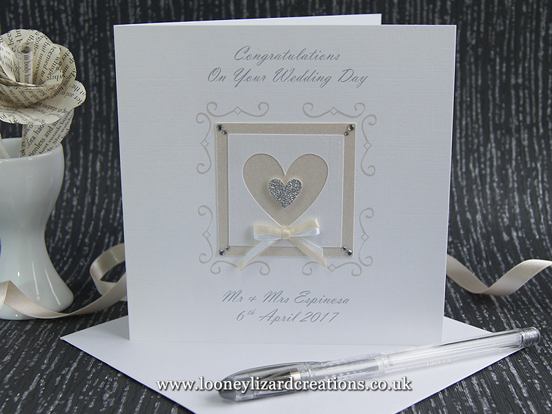 White linen wedding card with a framed heart with silver glitter