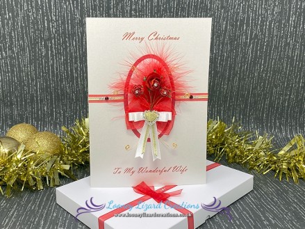Christmas Rose - A trio of red and white roses with gold wire spirals and swirls 