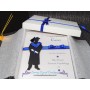 The Graduate Male -Features a silhouette of a male in graduation cap and gown with tassel, hood, and rolled degree. Can be fully personalised. and includes decorated gift box.