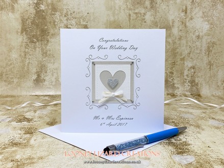 True Love: A simple yet elegant wedding card design in ivory with just a hint of sparkle.