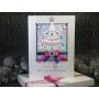 Festive Christmas Tree - Featuring a framed glistening white Christmas tree, brightly adorned