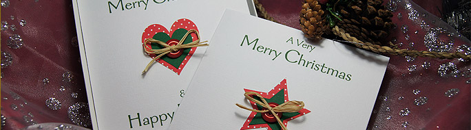 Christmas card pack with heart and star, includes button and natural raffia