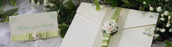 Wedding Invitations with rose and ribbon belly band